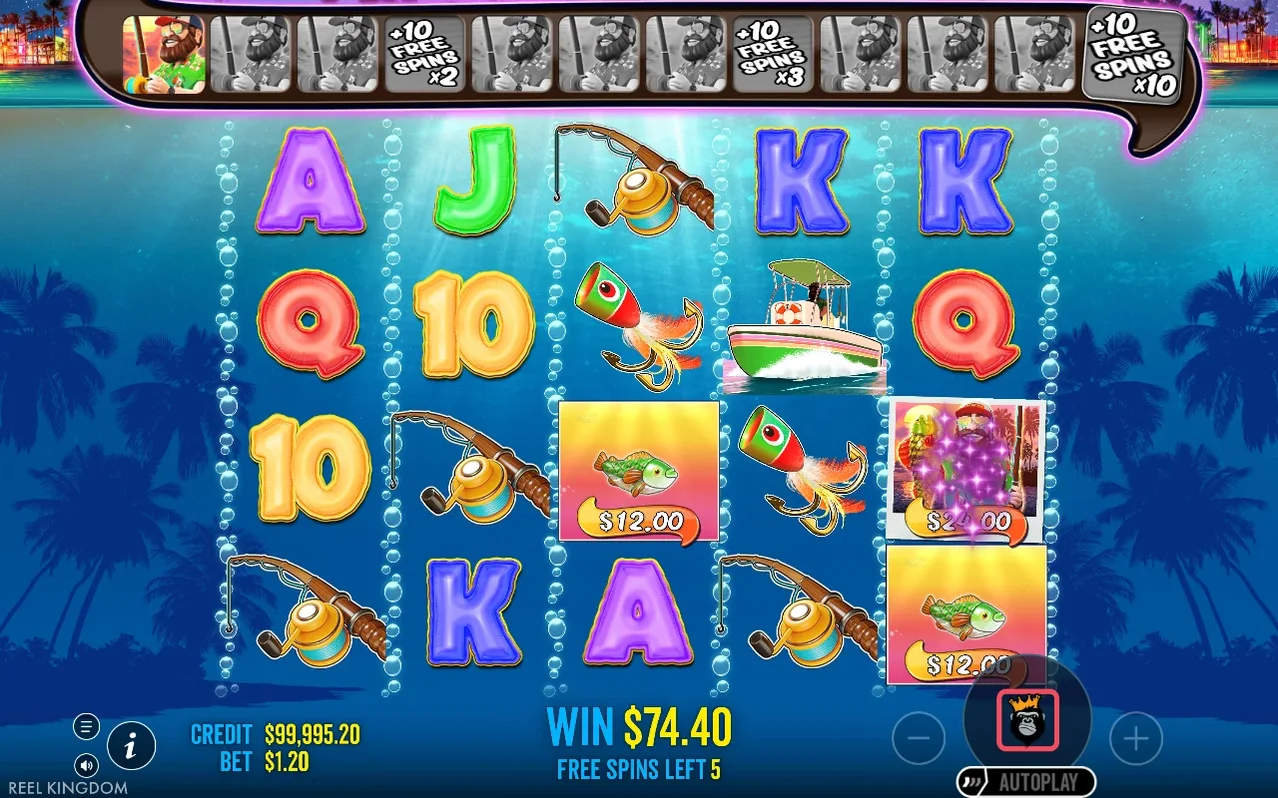 Free spins reel shows WIN $74.40, 5 spins left, and a lit wild collecting a $24.00 fish tag amid $12.00 tags.